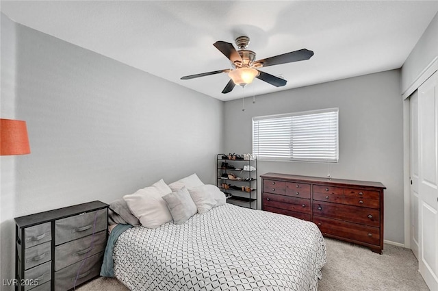 722 Chepstow Ave, Las Vegas, NV 89178 - bedroom with a ceiling fan, baseboards, light carpet, and a closet