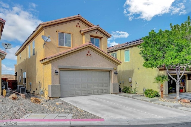 722 Chepstow Ave, Las Vegas, NV 89178 - view of front facade with central AC, a tile roof, a garage, stucco siding, and driveway