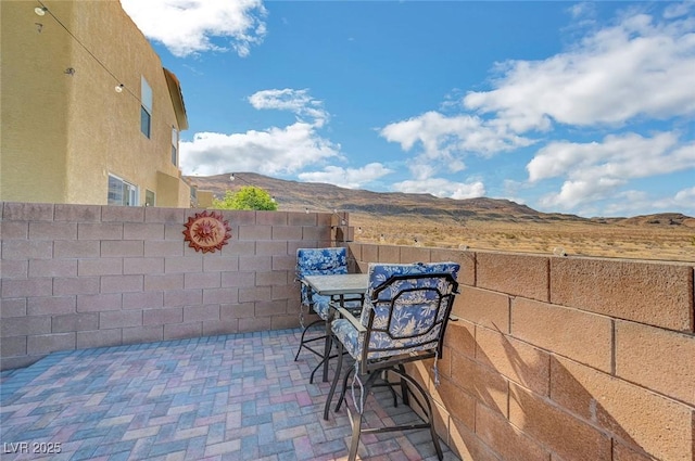 722 Chepstow Ave, Las Vegas, NV 89178 - view of patio with fence and a mountain view