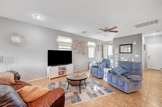 722 Chepstow Ave, Las Vegas, NV 89178 - living room featuring light tile patterned floors, a ceiling fan, and visible vents