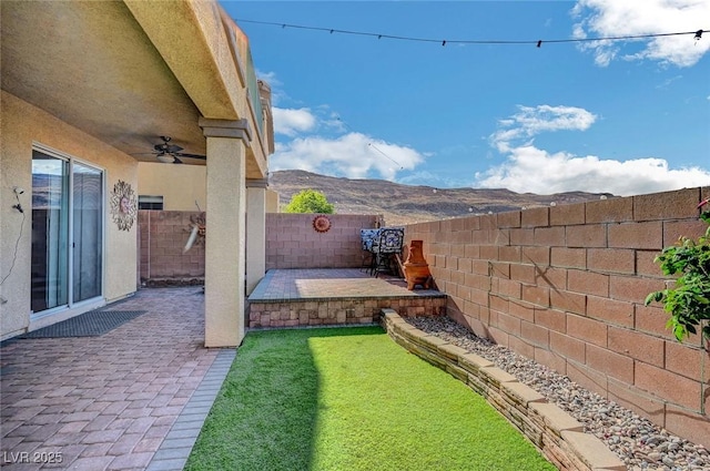 722 Chepstow Ave, Las Vegas, NV 89178 - view of yard featuring a patio, a fenced backyard, and ceiling fan