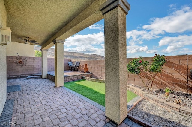 722 Chepstow Ave, Las Vegas, NV 89178 - view of patio featuring a ceiling fan and a fenced backyard