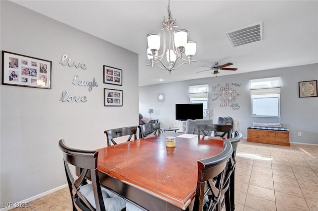 722 Chepstow Ave, Las Vegas, NV 89178 - dining area featuring baseboards, visible vents, light tile patterned floors, and ceiling fan with notable chandelier