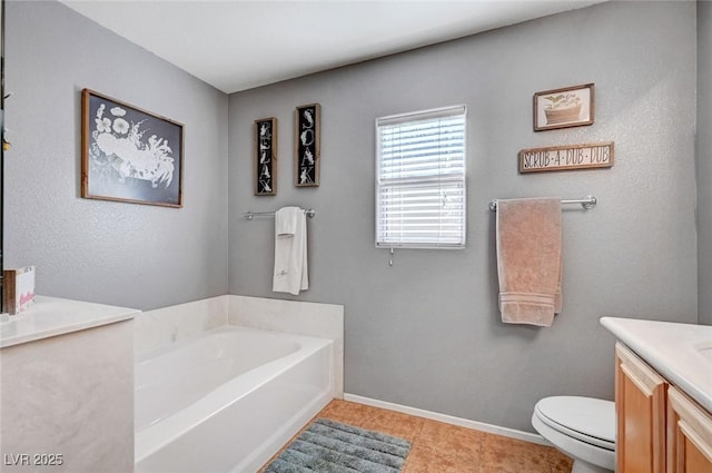 722 Chepstow Ave, Las Vegas, NV 89178 - bathroom with a bath, tile patterned flooring, vanity, baseboards, and toilet