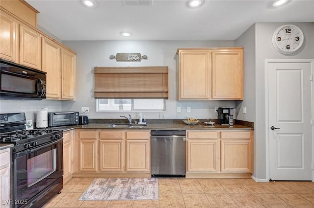 722 Chepstow Ave, Las Vegas, NV 89178 - kitchen with a sink, light tile patterned floors, a toaster, black appliances, and light brown cabinets