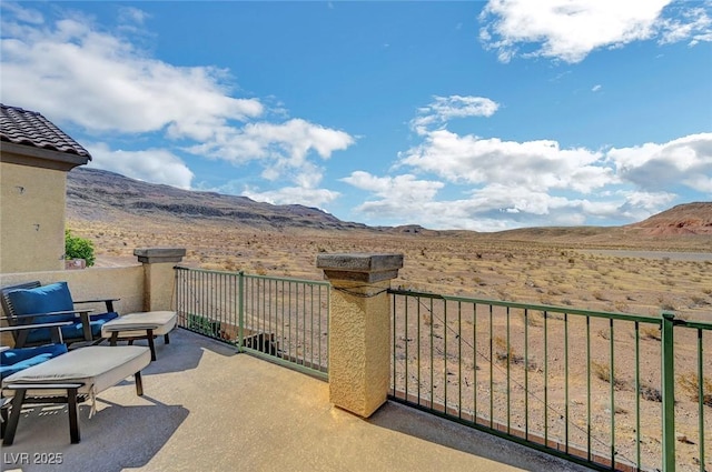 722 Chepstow Ave, Las Vegas, NV 89178 - view of patio / terrace with a mountain view and a balcony