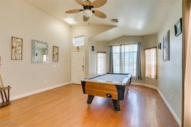 recreation room featuring visible vents, light wood-type flooring, pool table, a ceiling fan, and vaulted ceiling