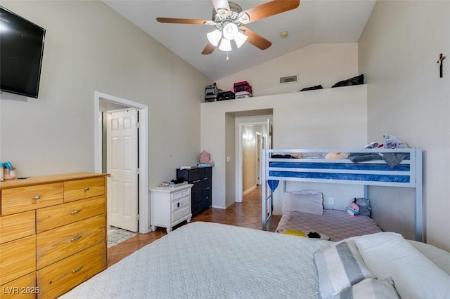 bedroom with tile patterned flooring, visible vents, ceiling fan, and lofted ceiling