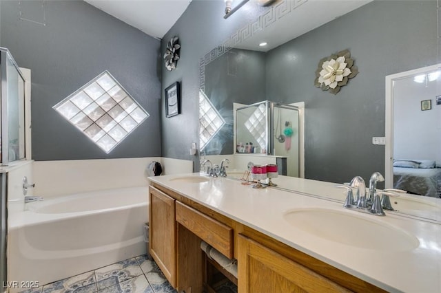 full bath with a garden tub, a sink, a stall shower, and double vanity