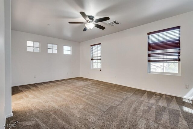 345 Gracious Way, Henderson, NV 89011 - empty room featuring carpet floors, a ceiling fan, and baseboards