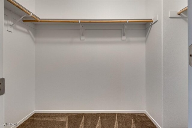 345 Gracious Way, Henderson, NV 89011 - spacious closet featuring dark carpet