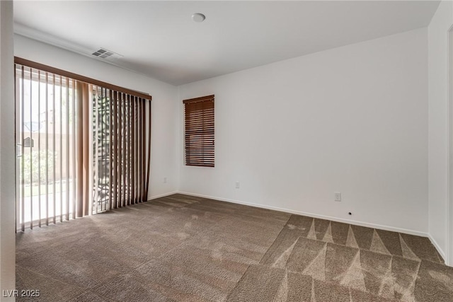 345 Gracious Way, Henderson, NV 89011 - carpeted spare room with plenty of natural light and baseboards