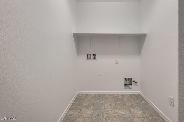 345 Gracious Way, Henderson, NV 89011 - laundry room with hookup for a washing machine, baseboards, hookup for a gas dryer, and stone finish flooring