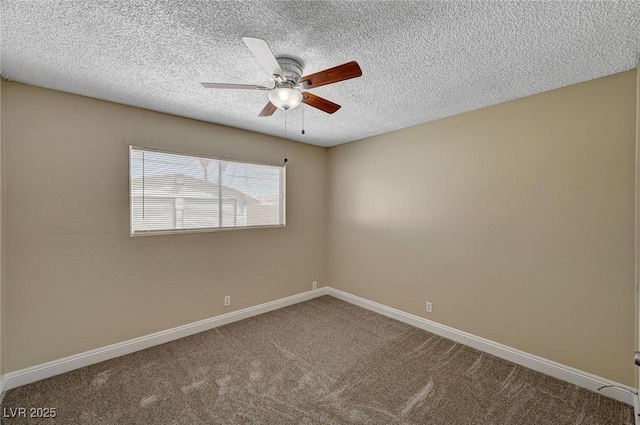carpeted empty room with a ceiling fan, a textured ceiling, and baseboards