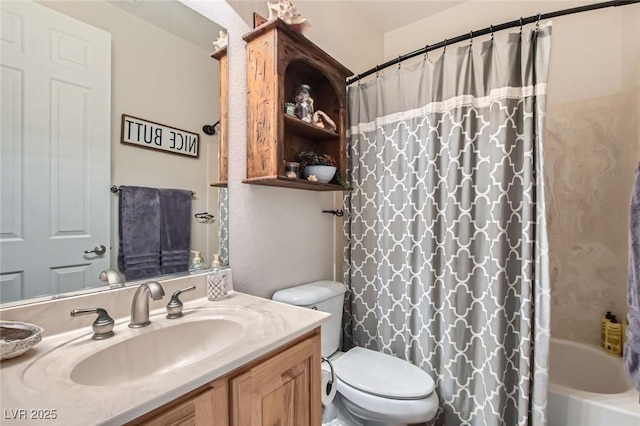 full bath with toilet, shower / bath combo with shower curtain, and vanity