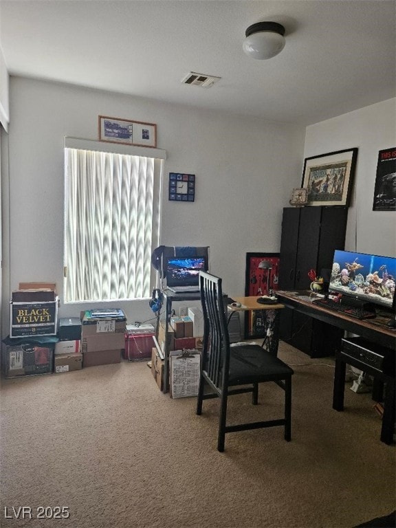 office space with carpet and visible vents