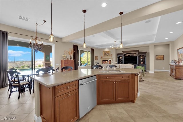 kitchen featuring visible vents, a sink, dishwasher, and a chandelier