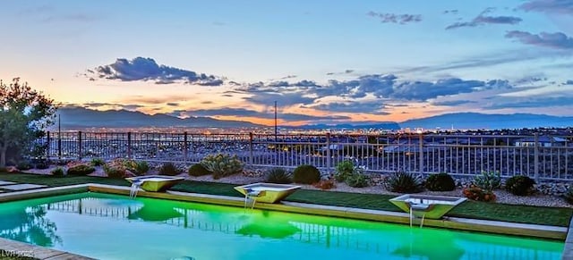 view of pool featuring fence and a fenced in pool
