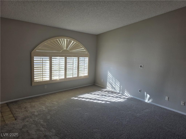 734 Rusty Spur Dr, Henderson, NV 89014 - empty room featuring baseboards, a textured ceiling, and carpet
