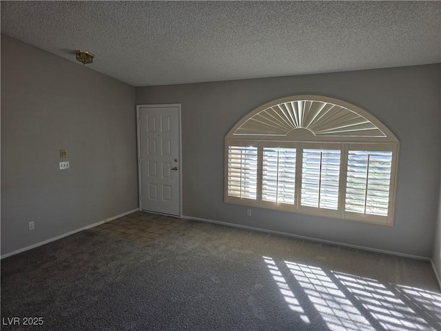 734 Rusty Spur Dr, Henderson, NV 89014 - spare room with baseboards, carpet, and a textured ceiling