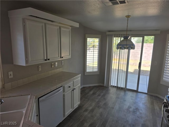 734 Rusty Spur Dr, Henderson, NV 89014 - kitchen featuring dishwasher, white cabinetry, baseboards, tile countertops, and dark wood-style floors