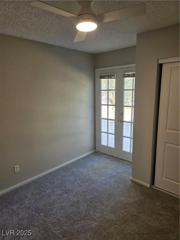 734 Rusty Spur Dr, Henderson, NV 89014 - unfurnished room featuring carpet flooring, a textured ceiling, baseboards, and french doors