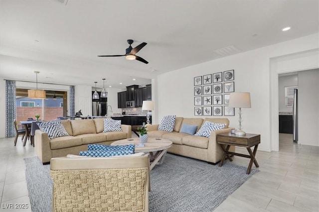 3136 Mossfield Ave, Henderson, NV 89052 - living room with ceiling fan, light tile patterned flooring, and recessed lighting
