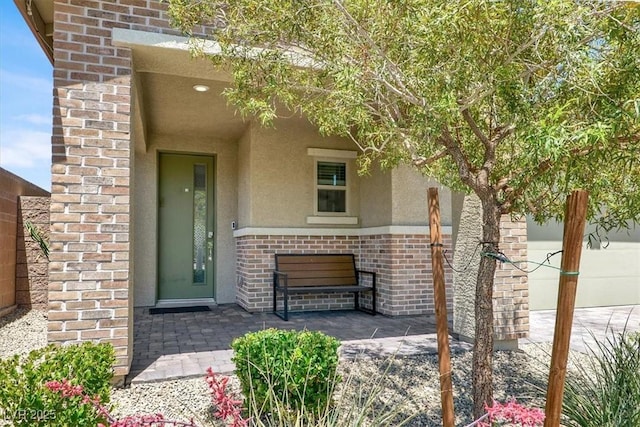 3136 Mossfield Ave, Henderson, NV 89052 - property entrance with stucco siding and brick siding