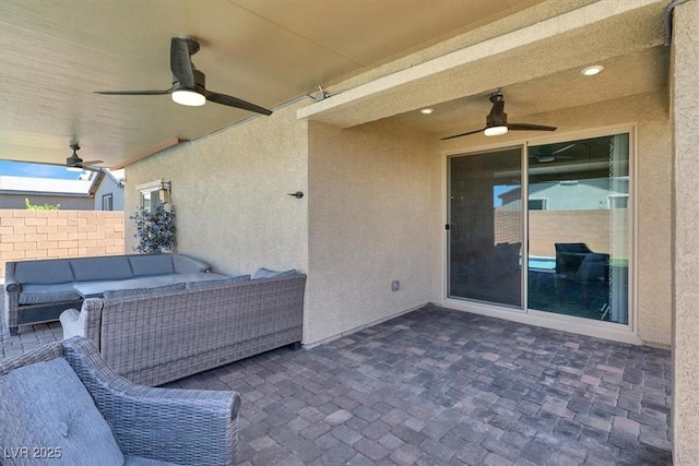 3136 Mossfield Ave, Henderson, NV 89052 - view of patio featuring ceiling fan and an outdoor living space