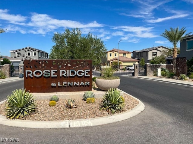 3136 Mossfield Ave, Henderson, NV 89052 - community / neighborhood sign featuring a gate and a residential view