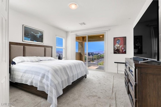 3136 Mossfield Ave, Henderson, NV 89052 - bedroom with access to outside and light carpet