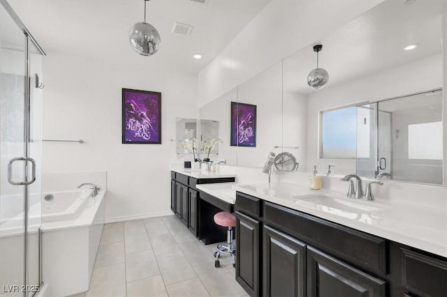 3136 Mossfield Ave, Henderson, NV 89052 - full bath featuring vanity, a stall shower, a garden tub, tile patterned flooring, and recessed lighting