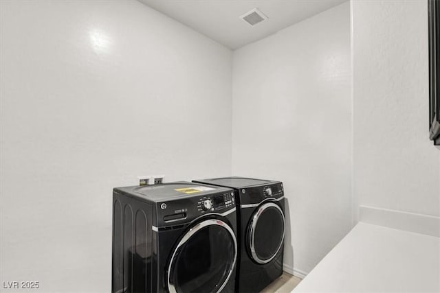 3136 Mossfield Ave, Henderson, NV 89052 - washroom with independent washer and dryer and baseboards
