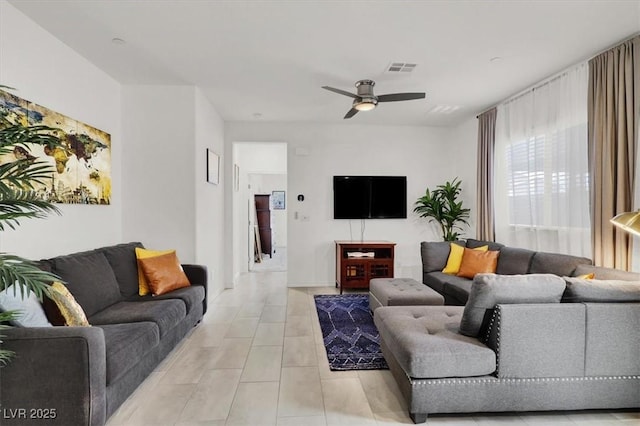 3136 Mossfield Ave, Henderson, NV 89052 - living room with ceiling fan and light tile patterned flooring