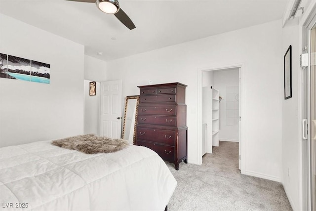 3136 Mossfield Ave, Henderson, NV 89052 - bedroom with light carpet, a ceiling fan, and a spacious closet