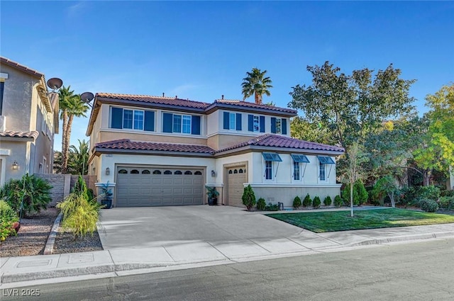 mediterranean / spanish-style home featuring an attached garage, stucco siding, driveway, and a tile roof