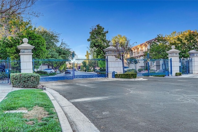 view of gate featuring fence