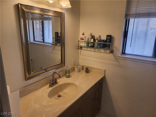 3164 Elmrock Pl, Las Vegas, NV 89121 - bathroom featuring a wealth of natural light and vanity