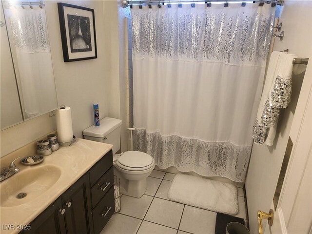 3164 Elmrock Pl, Las Vegas, NV 89121 - full bath featuring vanity, tile patterned flooring, toilet, and a shower with shower curtain