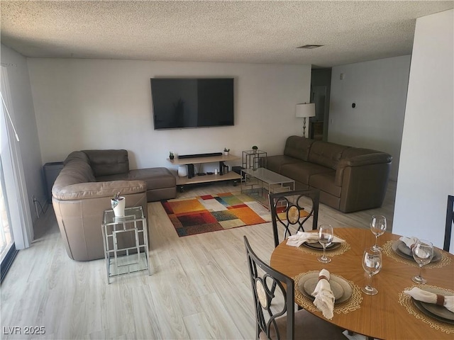 3164 Elmrock Pl, Las Vegas, NV 89121 - living room with a textured ceiling and wood finished floors