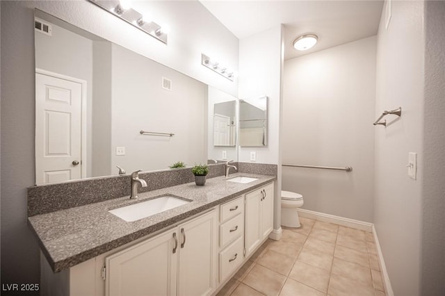 full bathroom featuring a sink, tile patterned floors, baseboards, and visible vents