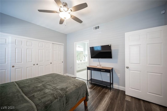 bedroom with a ceiling fan, baseboards, dark wood-type flooring, visible vents, and a closet