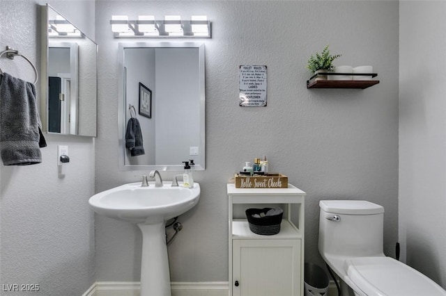 half bathroom with toilet