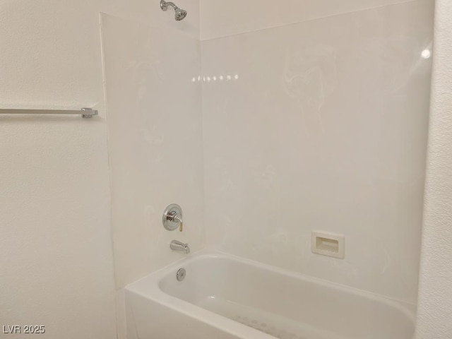 full bathroom with shower / washtub combination