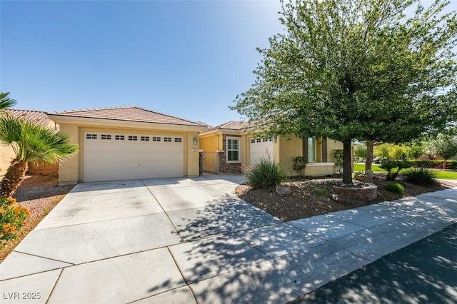 7349 Royal Melbourne Dr, Las Vegas, NV 89131 - ranch-style home with a garage, stucco siding, a tile roof, and concrete driveway