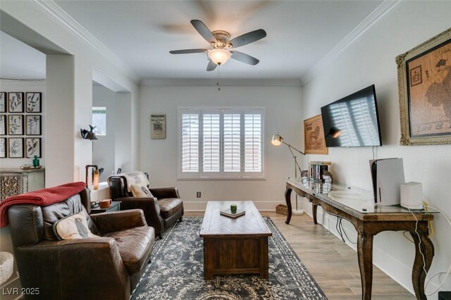 7349 Royal Melbourne Dr, Las Vegas, NV 89131 - living area featuring a ceiling fan, baseboards, ornamental molding, and wood finished floors