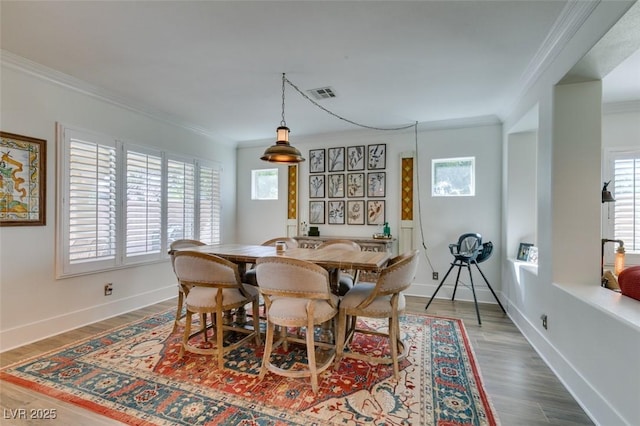 7349 Royal Melbourne Dr, Las Vegas, NV 89131 - dining room featuring a wealth of natural light, ornamental molding, and visible vents