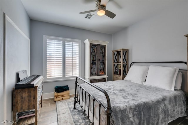 7349 Royal Melbourne Dr, Las Vegas, NV 89131 - bedroom with ceiling fan, baseboards, visible vents, and wood finished floors