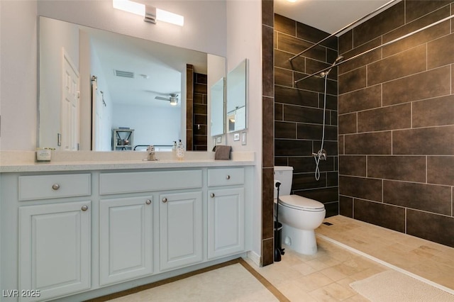 7349 Royal Melbourne Dr, Las Vegas, NV 89131 - bathroom with vanity, toilet, tiled shower, and visible vents