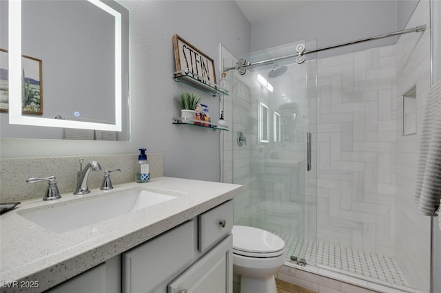 7349 Royal Melbourne Dr, Las Vegas, NV 89131 - full bathroom with vanity, a stall shower, and toilet
